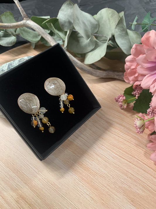 Koralli-korvakorut (hiekka)